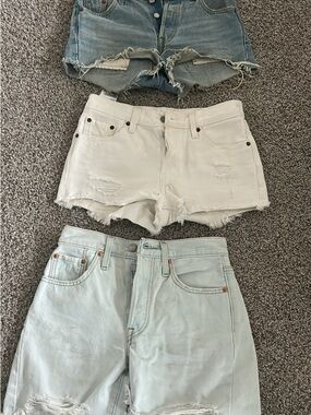 Levi's White Distressed Denim Shorts with Frayed Hem